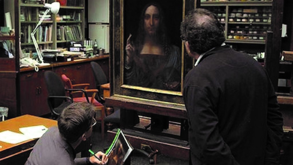 Robert Simon inspection of the Salvator Mundi at the National Gallery (2011). Copyright Robert Simon - Courtesy of Sony Pictures Classics. Updated by Charlotte Sather for Tribeca Film Festival 2021