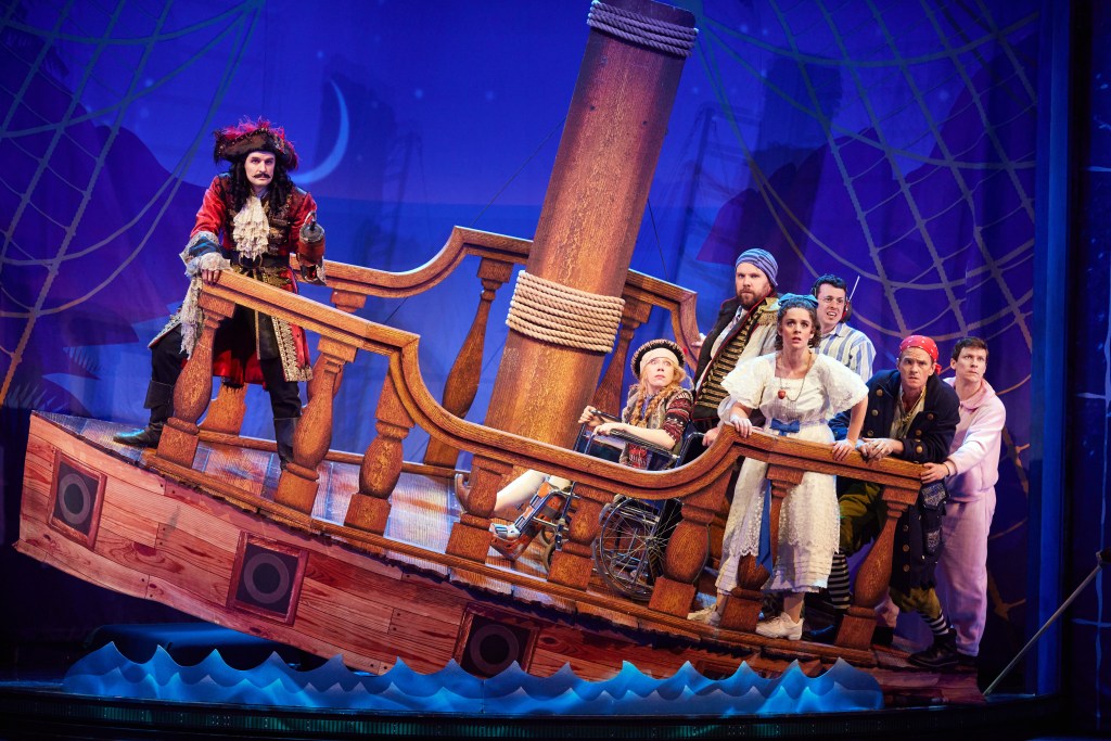 (L-R): Henry Shields, Ellie Morris, Henry Lewis, Charlie Russell, Jonathan Sayer, Neil Patrick Harris, Matthew Cavendish in 'Peter Pan Goes Wrong' (courtesy of Jeremy Daniel)