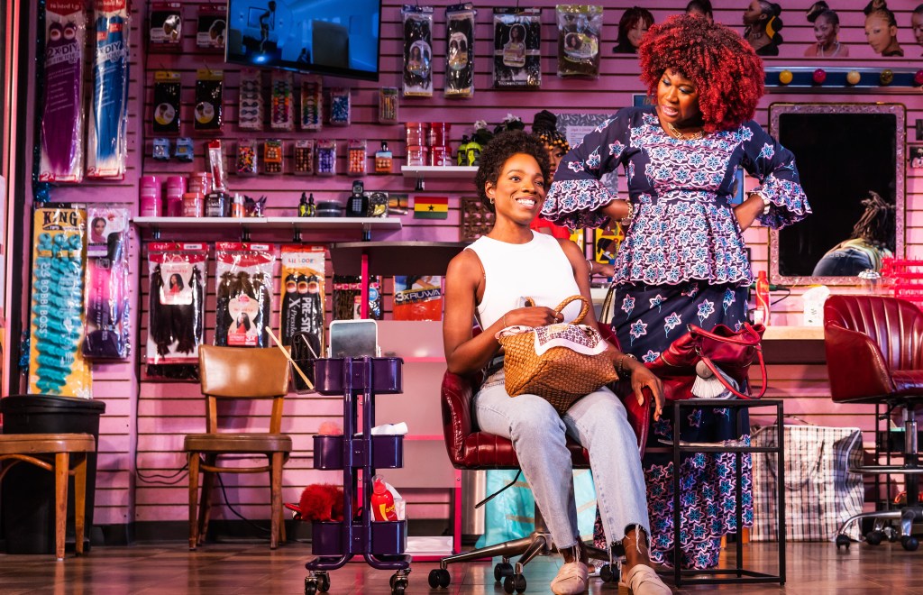 (L to R): Rachel Christopher, Zenzi Williams in 'Jaja's African Hair Braiding' (Matthew Murphy)