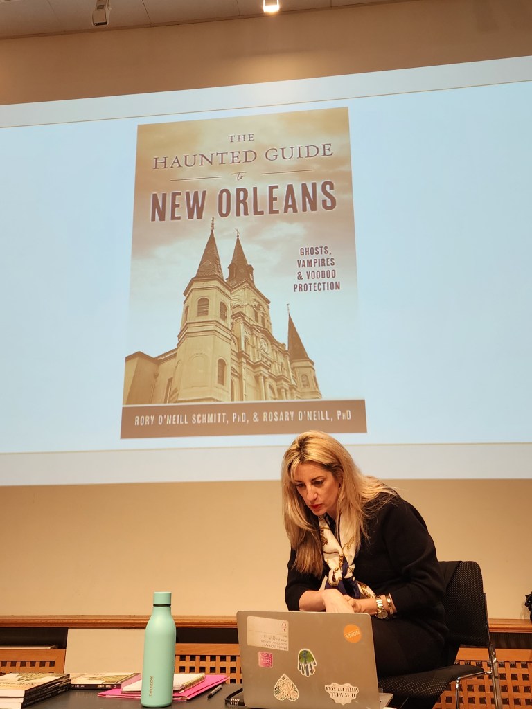 Rory introduces the book about ghosts at the presentation at the Irish Cultural Center (Carole Di Tosti)