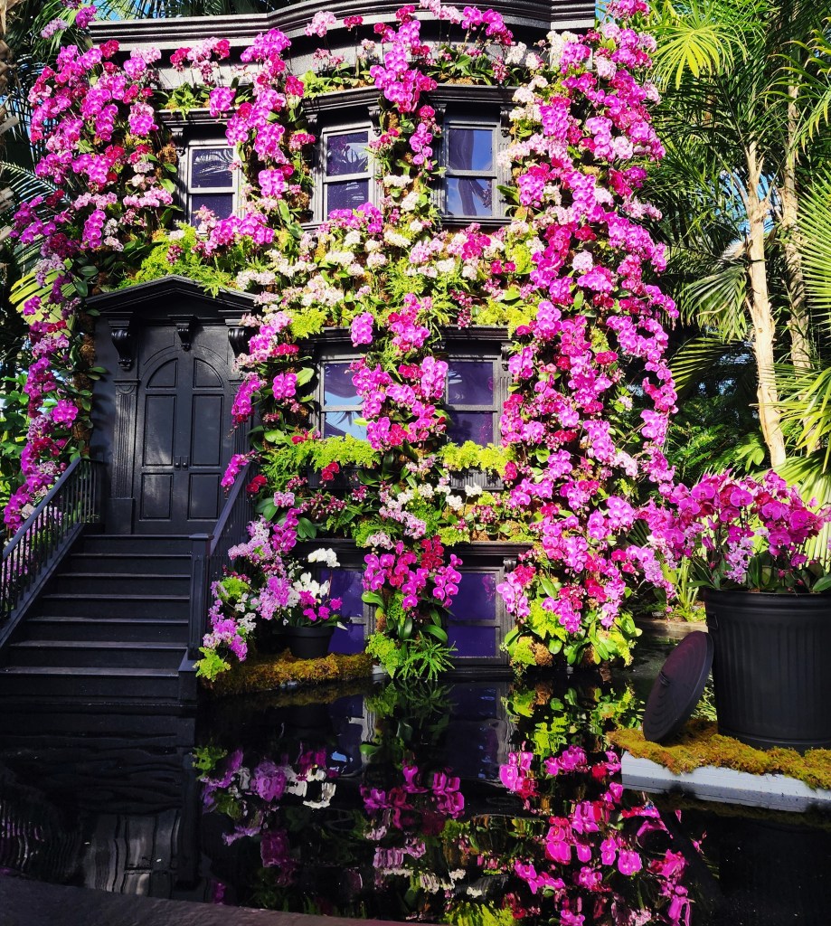 Townhouse beautified. 'Mr. Flower Fantastic's Concrete Jungle,' The Orchid Show, NYBG Palms  of the World Gallery (Carole Di Tosti)