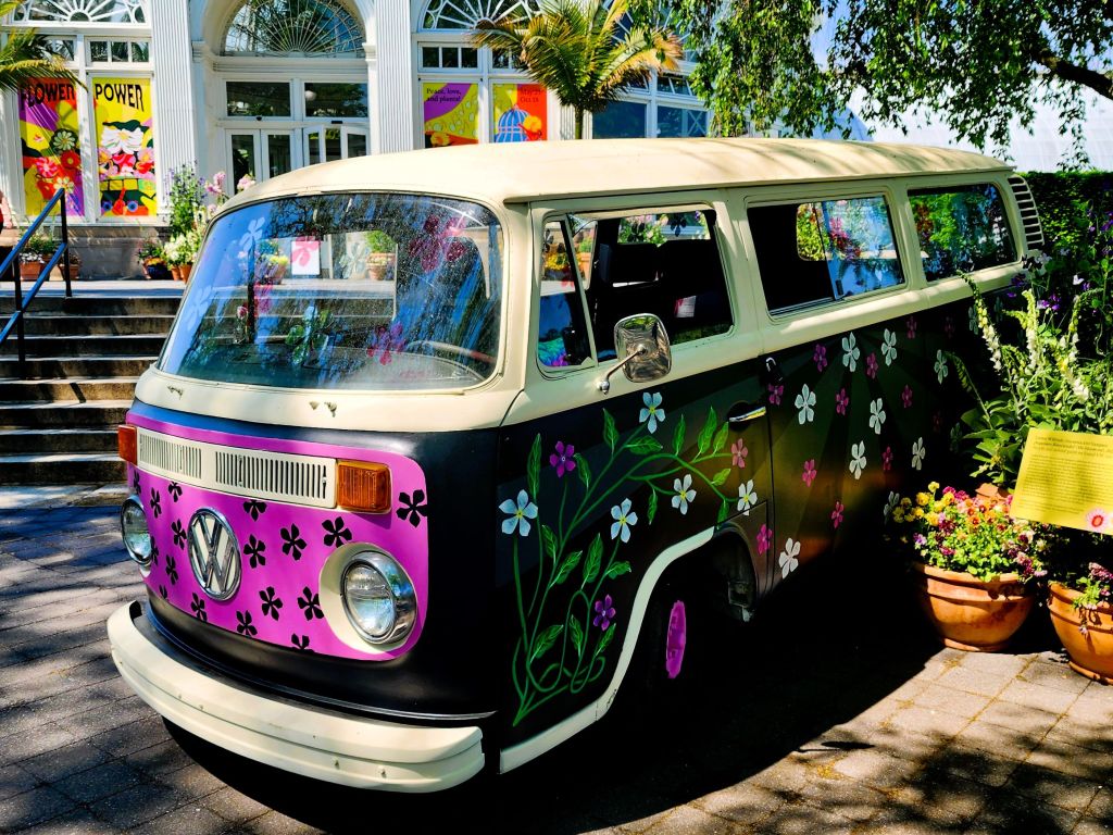 VW bus detail.  Acrylic and aerosol paint on found VW van by Carlos Wilfredo Encarnacion-Vazquez, an installation as part of the 'Flower Power' exhibit at NYBG (Carole Di Tosti)
