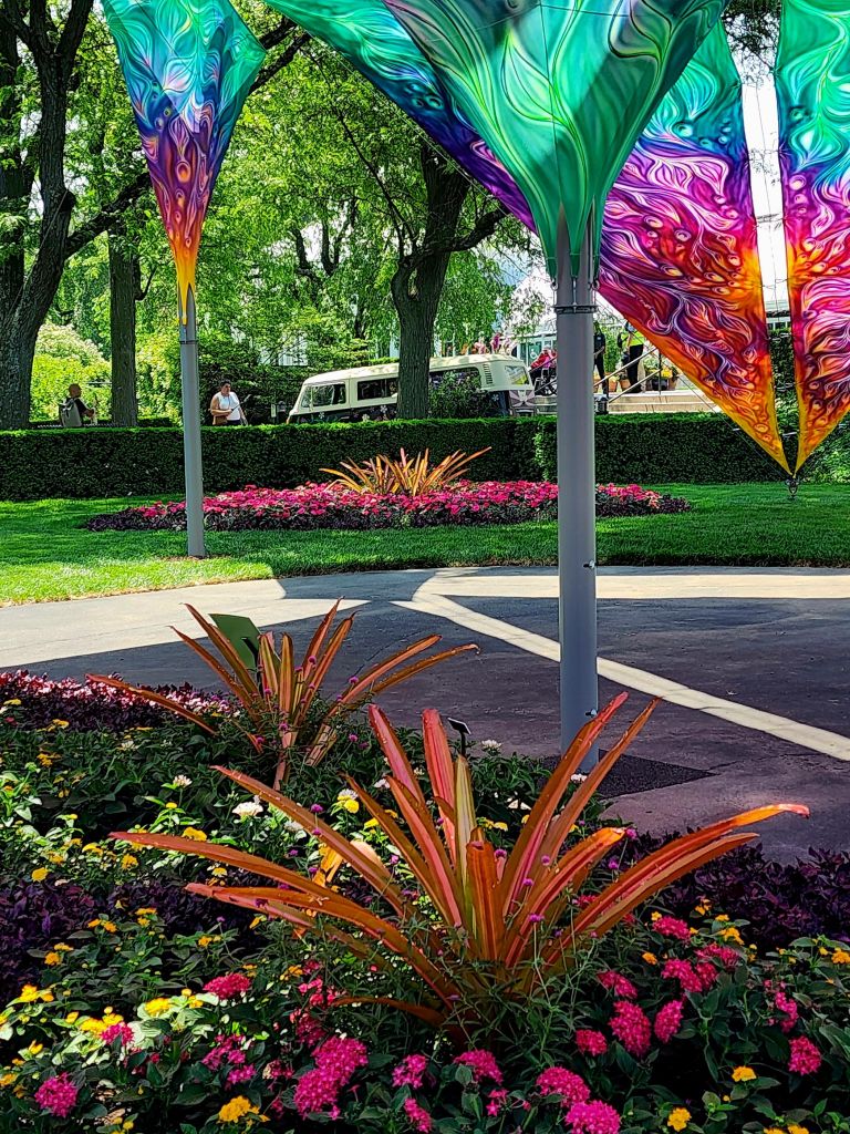 Hand painted installation detail on the great lawn facing the NYBG Enid A. Conservatory entrance to 'Flower Power' (Carole Di Tosti)