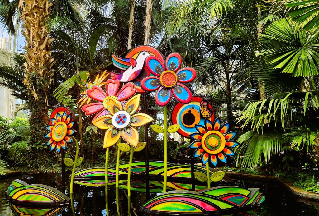 Sculptor Amie Jacobsen's take on "Flower Power," stained wood, steel, reesin and LED light, NYBG Palms of the World Gallery, Enid A. Haupt Conservatory, (Carole Di  Tosti) 