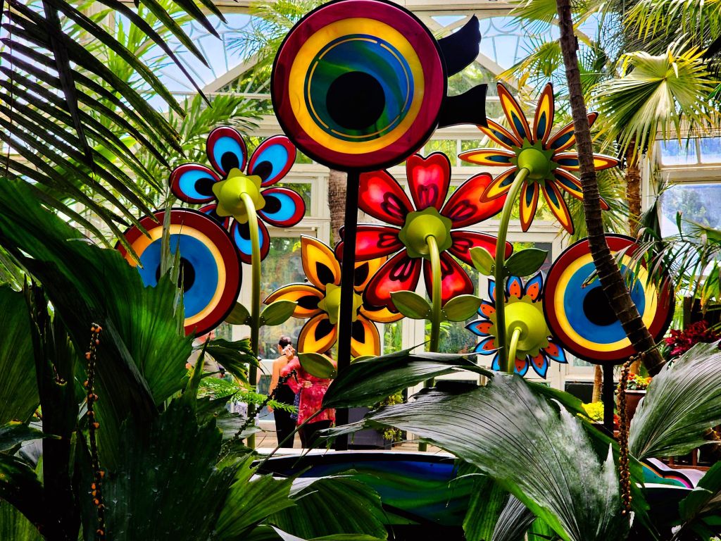 Behind Amie Jacobsen's installation which is even more intriguing at NYBG Palms of the World Gallery (Carole Di Tosti)
