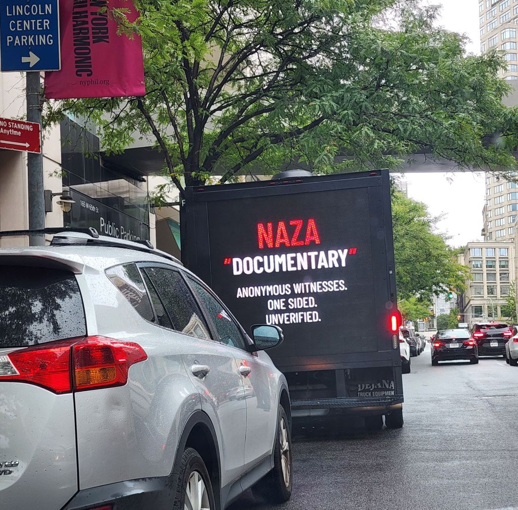 A truck illegally parked near the film screening as an answer to the 24 elite Israeli military whisleblowers confessing to bombing NAZA, a word which in itself proves the bombings as war crimes. (Carole Di Tosti)