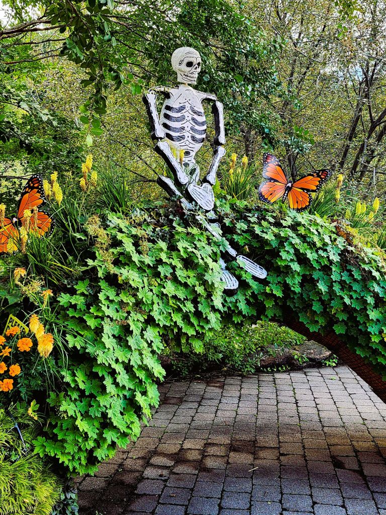 Another view of a calaveras relaxing, 'Dia de Los Muertos,' NYBG Everett Children's Adventure Garden (Carole Di Tosti)
